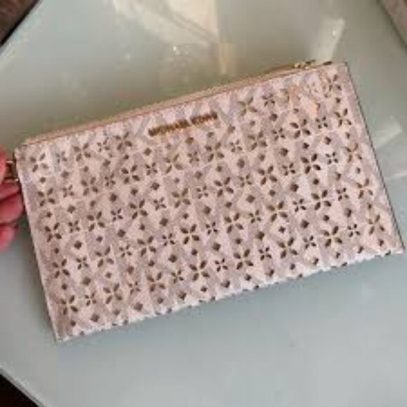 Michael Kors Cream Laser Cut Floral Wristlet - Picture 1 of 10